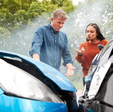 Two people at a car accident