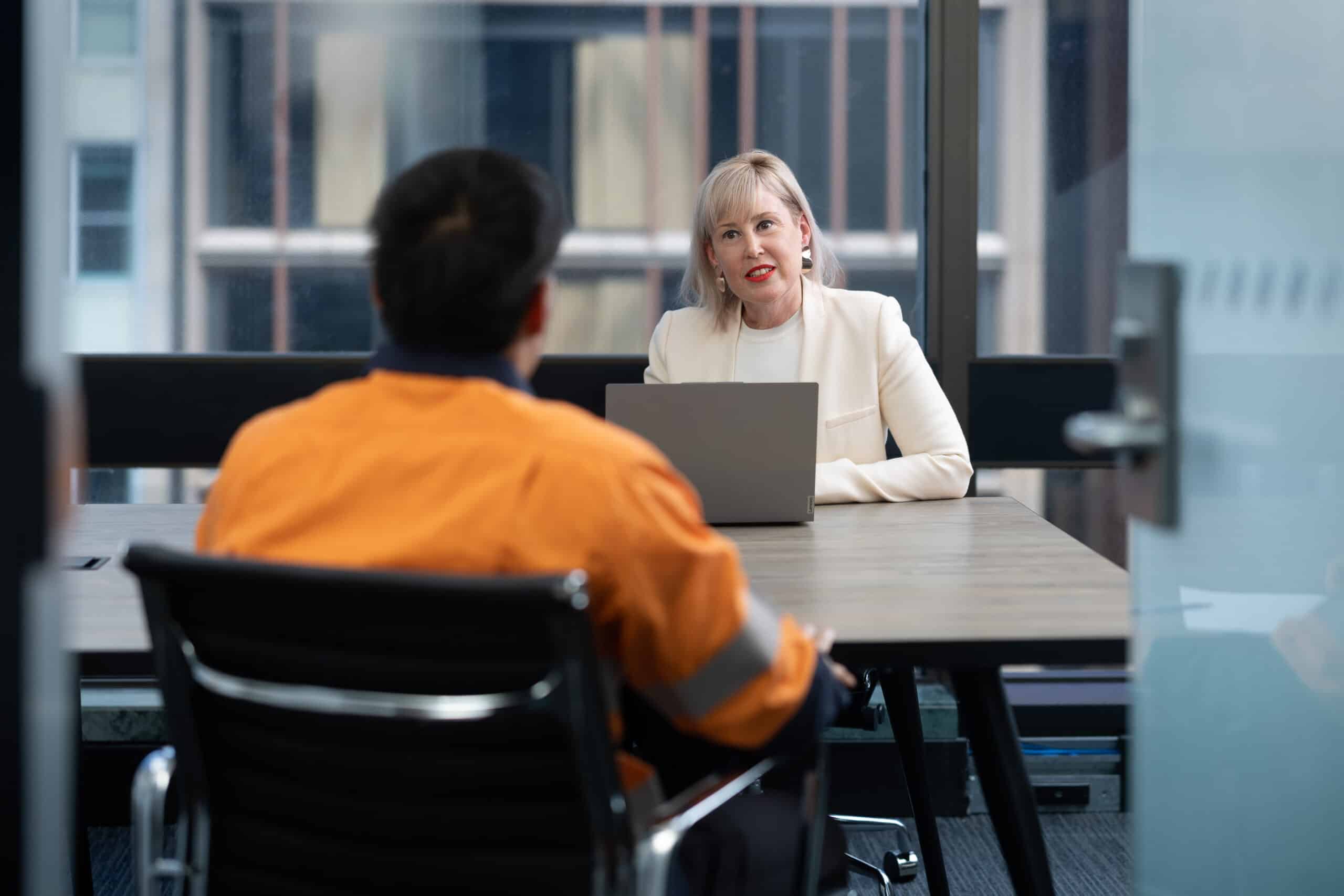 Goodman Spring lawyer meeting with a client about a compensation claim